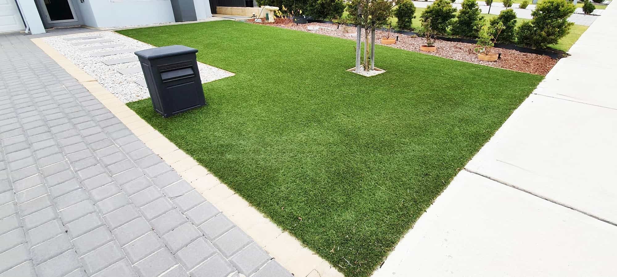 Artificial turf installation Northcote residential backyard
